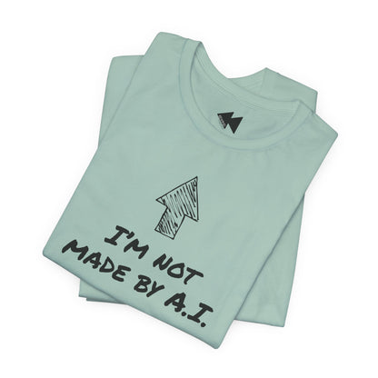 A folded teal short-sleeve t-shirt with a black graphic print featuring an arrow and the text 'I'M NOT MADE BY A.I.