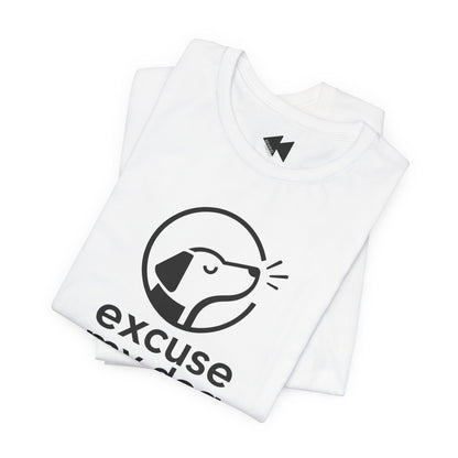 A folded white t-shirt with a black graphic of a dog inside a circle and the text 'excuse me' printed on the front, shown on a clean white background.