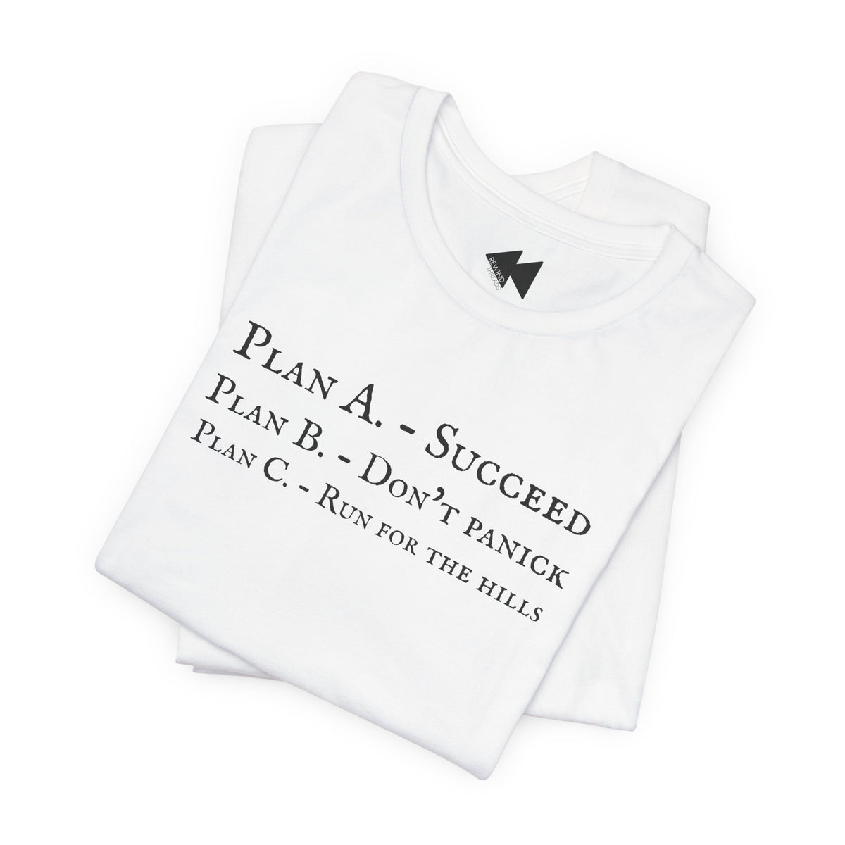 A folded white t-shirt short-sleeve crewneck with black printed text on the front reading 'PLAN A. - SUCCEED PLAN B. - DON'T PANICK PLAN C. RUN FOR THE HILLS'