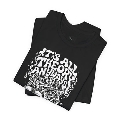 A folded navy blue t-shirt  t-shirt with a white graphic print on the front. The graphic features the text 'IT'S ALL THEORY ANYWAYS' in a stylized font above a psychedelic skull illustration.