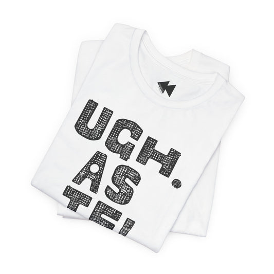 A folded white t-shirt with a black textured graphic reading 'UGH. AS IF'.