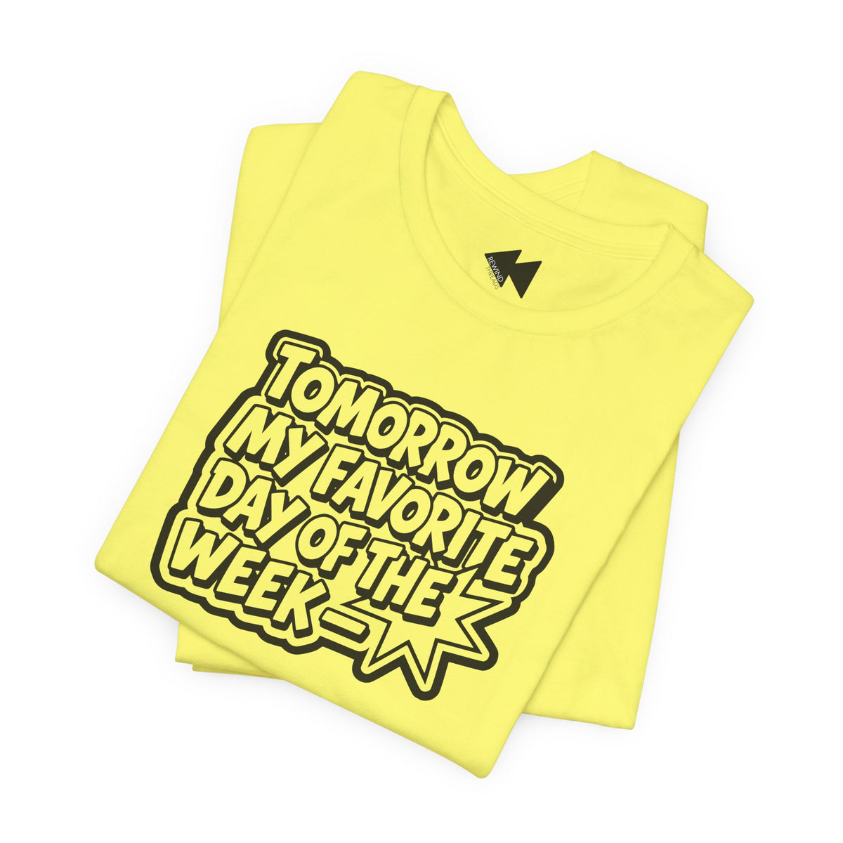 A folded bright yellow t-shirt with a black graphic text reading 'TOMORROW MY FAVORITE DAY OF THE WEEK' on a white background.
