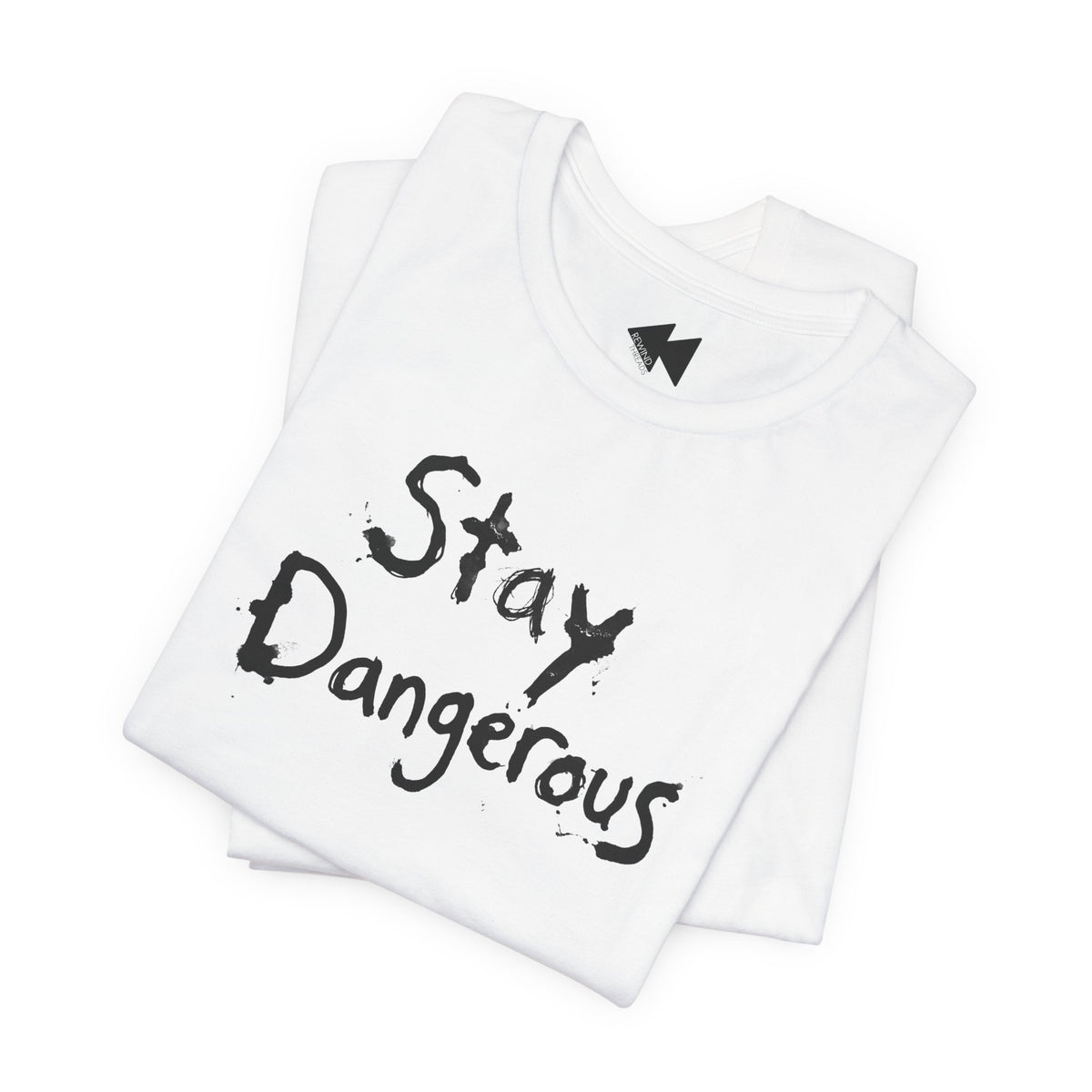 A folded white t-shirt with the words 'Stay Dangerous' printed in a black distressed brush font on the front, displayed on a clean white background.