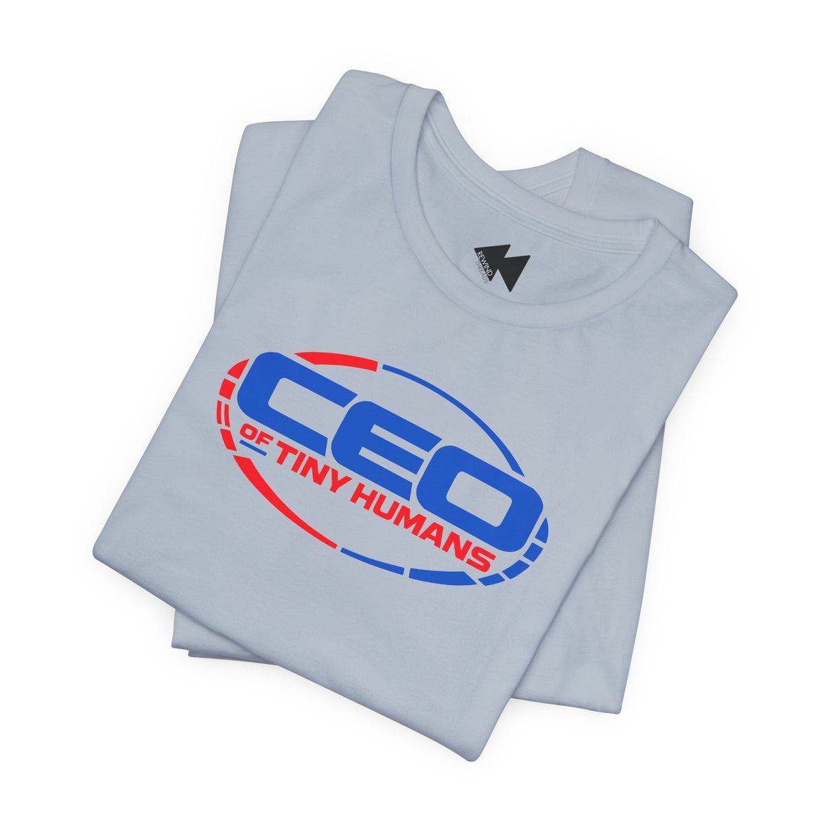 A light blue folded t-shirt with a graphic print reading 'CEO OF TINY HUMANS' in blue and red inside an oval outline, shown on a plain white background.