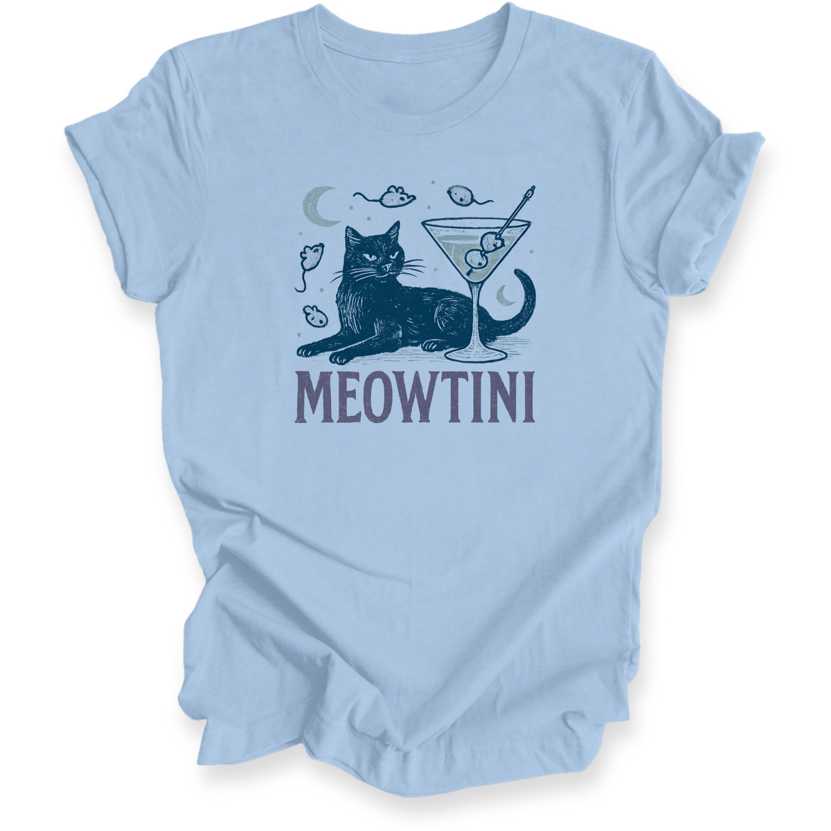 A light blue short-sleeve t-shirt with a graphic of a cat lounging next to a martini glass, with the text 'MEOWTINI' printed below in a dark purple font.