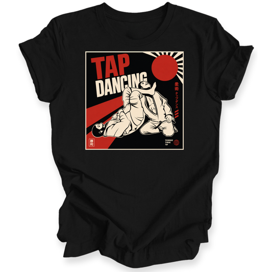 A black short-sleeve crewneck t-shirt with a vintage-style graphic print on the chest reading 'TAP DANCING' in red and white, featuring an illustration of two BJJ fighters and a red rising sun.
