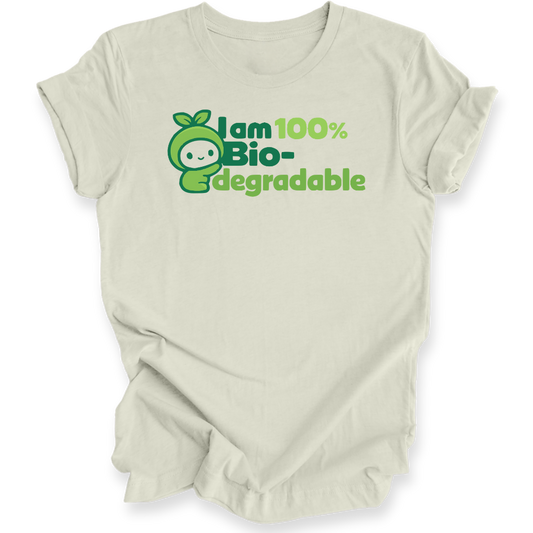 A light beige crewneck t-shirt with a green graphic on the chest that reads 'I am 100% Bio-degradable' next to a cute cartoon poop character wearing a leafy green hat.