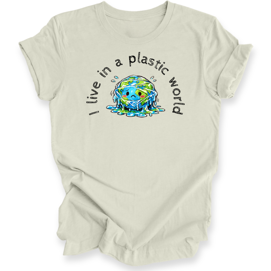 A light beige short-sleeve t-shirt with a graphic on the front showing a melting blue and green Earth with the text 'I live in a plastic world' arched above and below it, displayed on a clean white background.