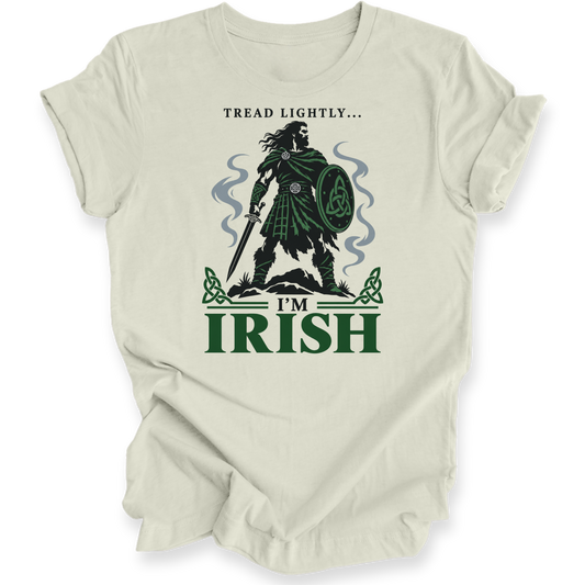 A citron crewneck t-shirt with a graphic print of a Irish tartan warrior holding a shield and sword, accompanied by the text 'Tread lightly I'm Irish".