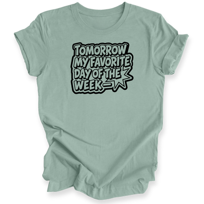 A sage green short-sleeve t-shirt with a black and white graphic text that reads 'TOMORROW MY FAVORITE DAY OF THE WEEK' on a white background.