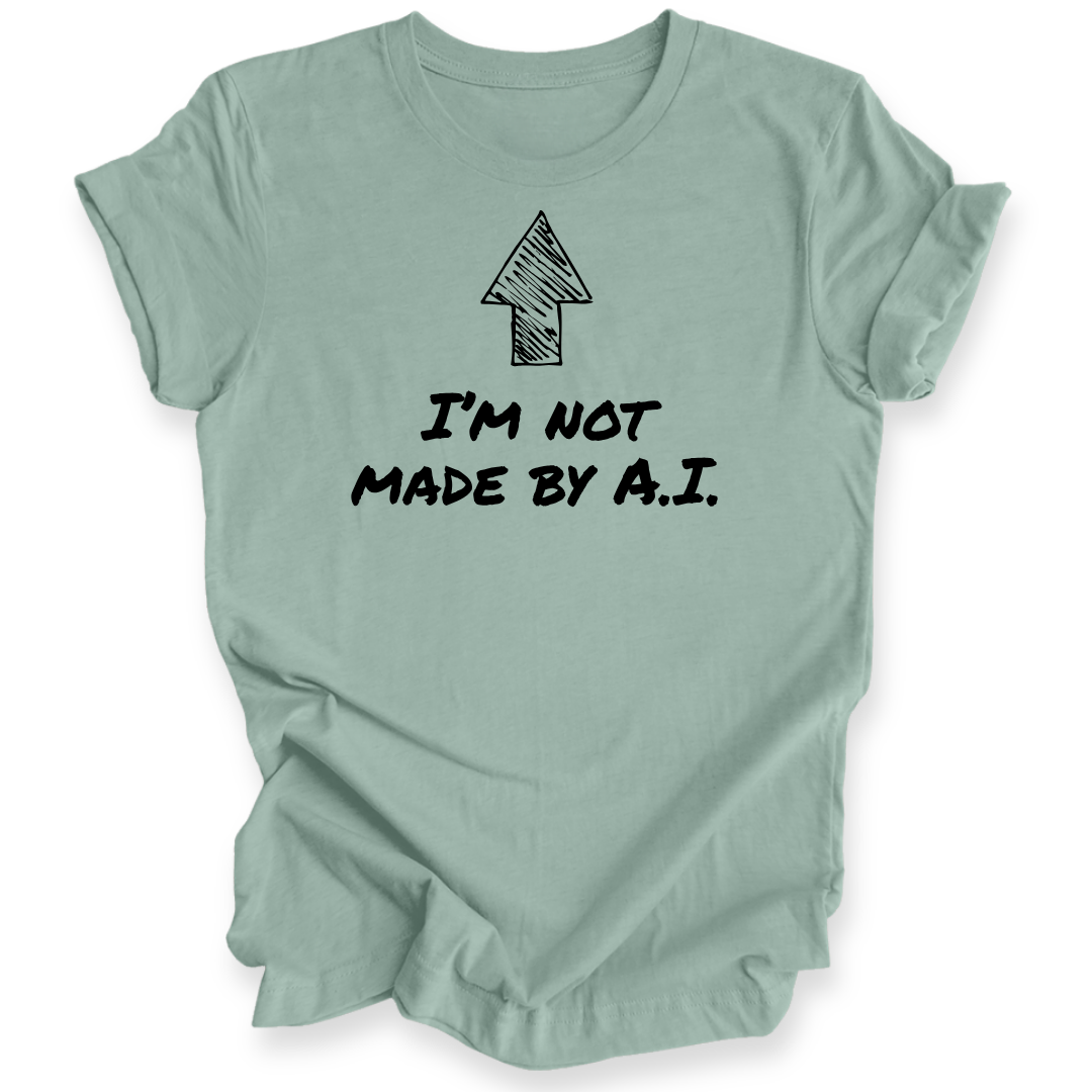 A teal short-sleeve t-shirt with a black graphic print featuring an arrow and the text 'I'M NOT MADE BY A.I.