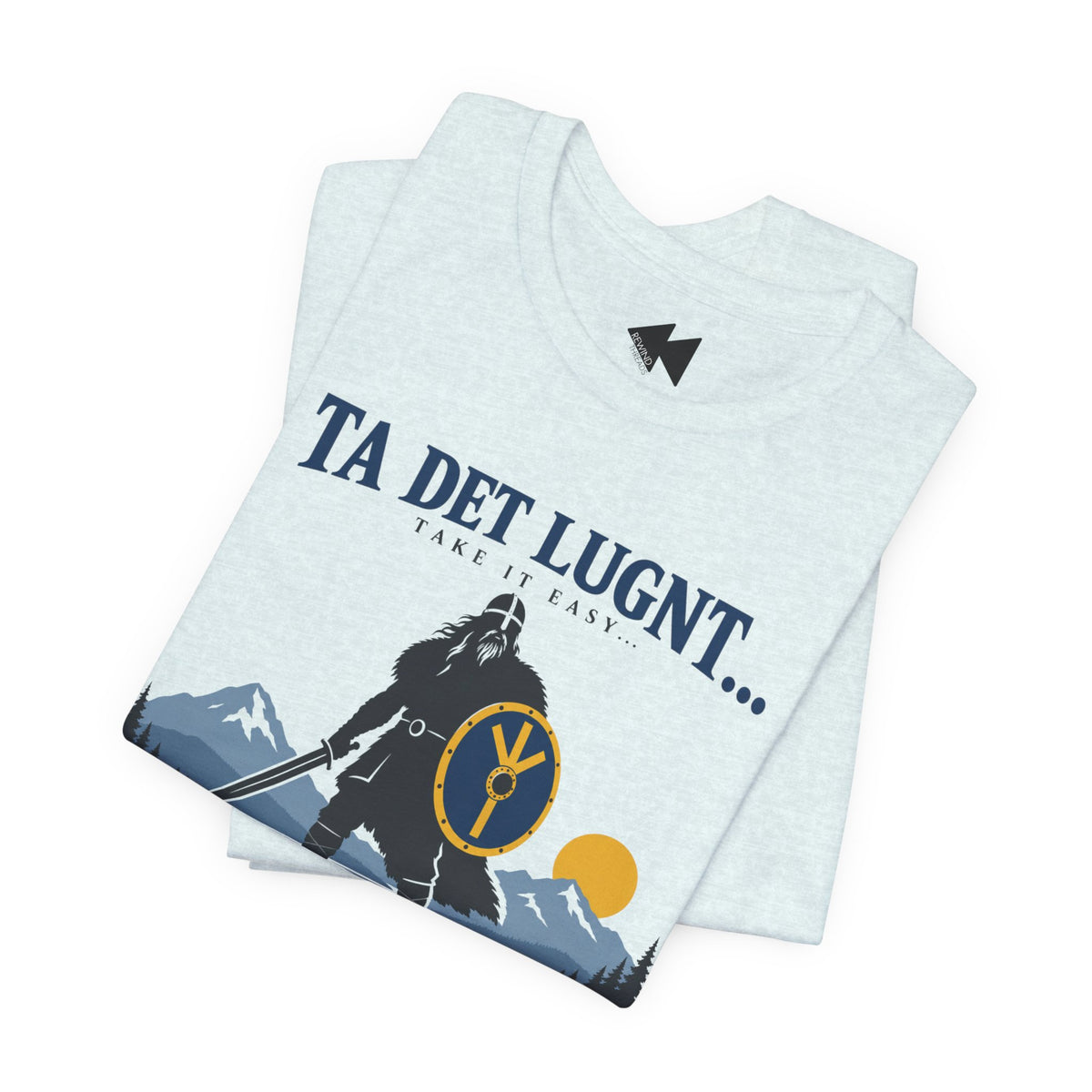 A folded light heather gray t-shirt with a graphic print of a Viking warrior, mountains, a shield, and the text 'TA DET LUGNT.