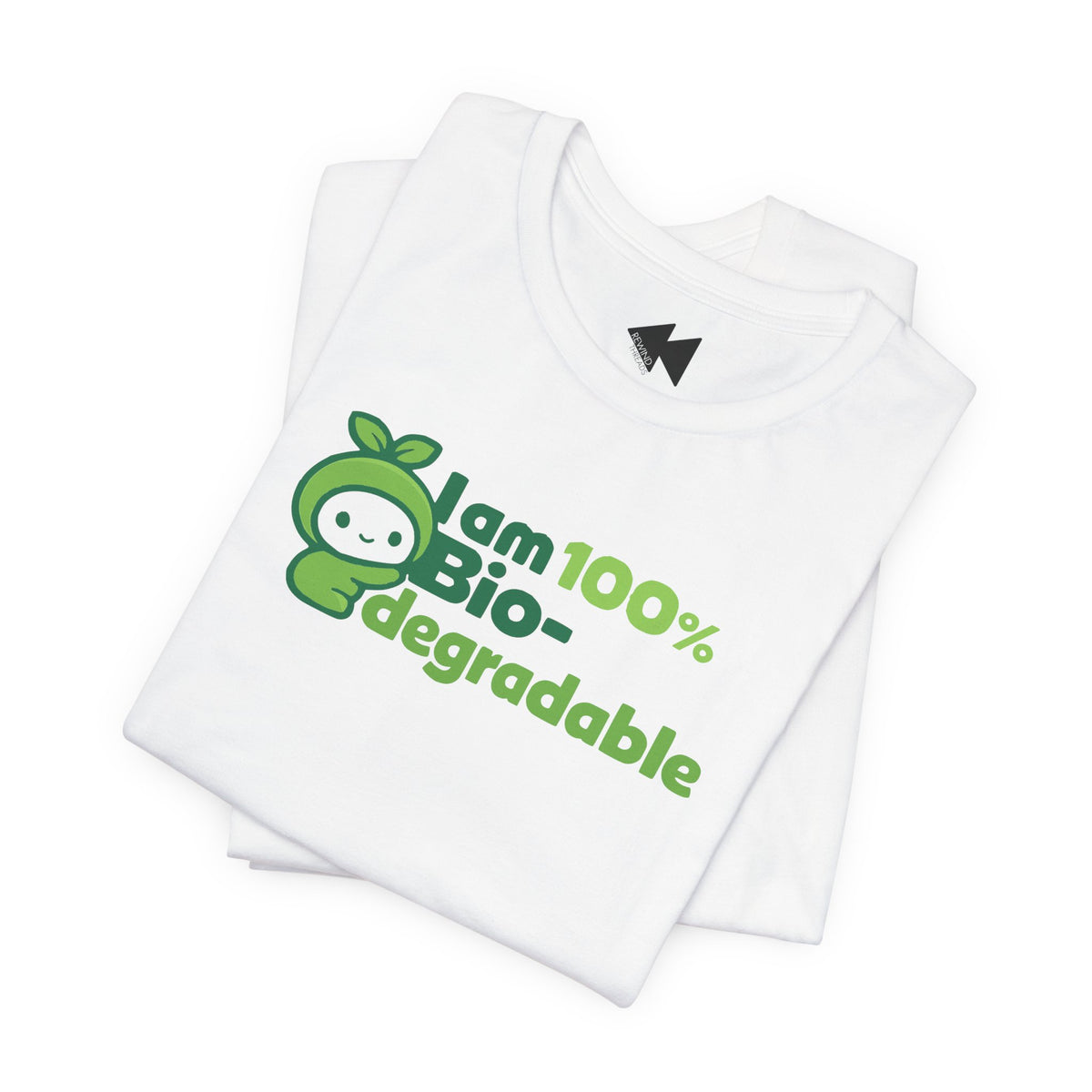A folded white t-shirt with a green graphic that reads 'I am 100% Bio-degradable' next to a cartoon apple character, shown on a plain white background.