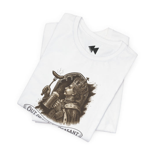 A folded white short-sleeve T-shirt with a vintage-style sepia illustration of a crowned figure holding a mug and a sausage on a fork, with partial text reading 'OUT OF .