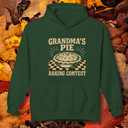 Green hoodie with 'Grandma's Pie Baking Contest' design on a background of autumn leaves.
