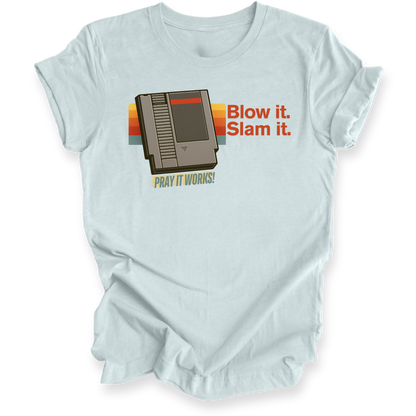 Light blue t-shirt with retro gaming console graphic and text on a white background