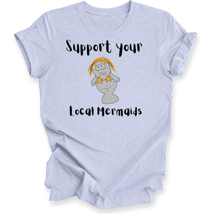 A light blue heather t-shirt with a graphic of a cartoon mermaid and the text 'Support your Local Mermaids' printed on the front, displayed on a clean white background.