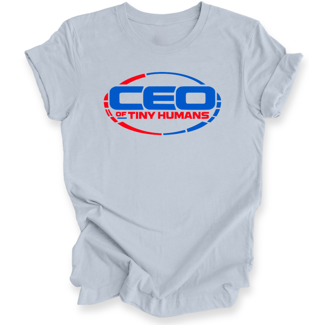 A light blue short-sleeve t-shirt with a graphic on the chest reading 'CEO OF TINY HUMANS' in blue and red inside an oval outline.