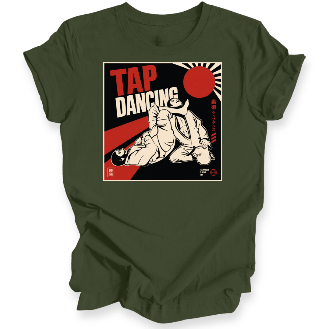 An olive green short-sleeve crewneck t-shirt with a vintage-style graphic print on the chest reading 'TAP DANCING' in red and white, featuring an illustration of two BJJ fighters and a red rising sun.