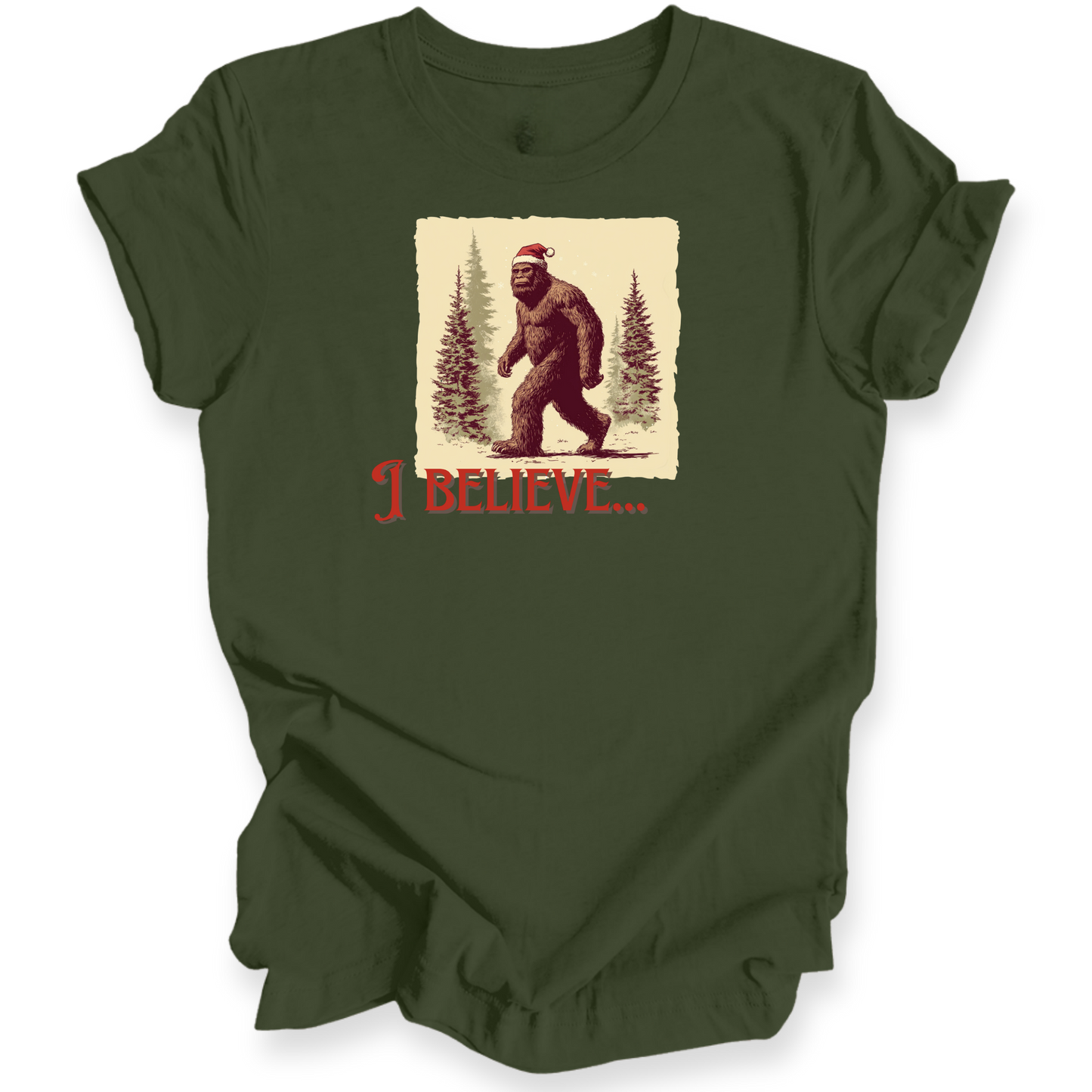Green t-shirt with a graphic of a bear wearing a Santa hat and 'I Believe' text on a white background