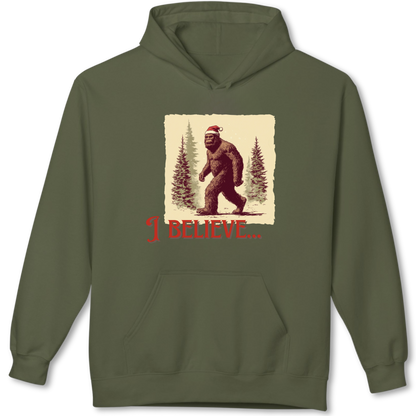 Green hoodie with a graphic of a bear wearing a Santa hat and 'I Believe' text on a white background