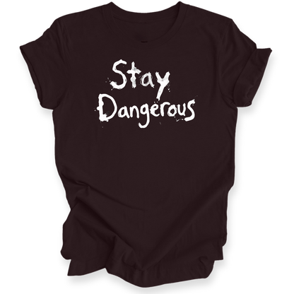 A dark maroon t-shirt with the words 'Stay Dangerous' printed in a black distressed brush font on the front, displayed on a clean white background.