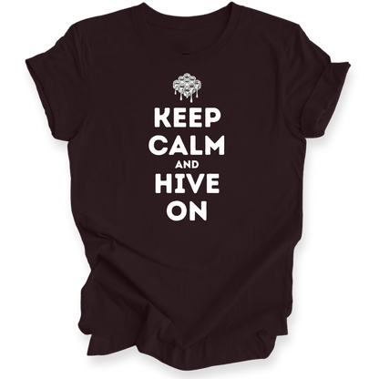 A dark brown short-sleeve t-shirt with a white graphic print that reads 'KEEP CALM AND HIVE ON' under a dripping honeycomb icon, displayed on a clean white background.