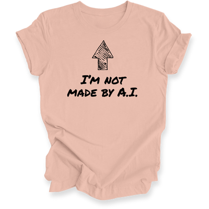 A peach-colored short-sleeve t-shirt with a black graphic of an arrow and the text 'I'M NOT MADE BY A.I.