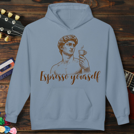 Light blue hoodie with a statue holding a cup design and 'Espresso yourself' text on a wooden background.