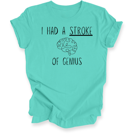 A mint green short-sleeve t-shirt with a black graphic print that reads 'I HAD A STROKE OF GENIUS' with a simple brain illustration in the center, displayed on a clean white background.