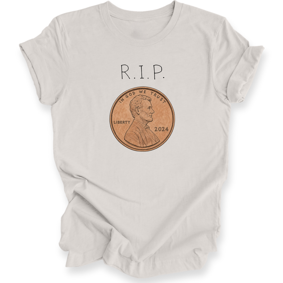 A light beige crewneck t-shirt with a graphic print of 'R.I.P.' with a penny.