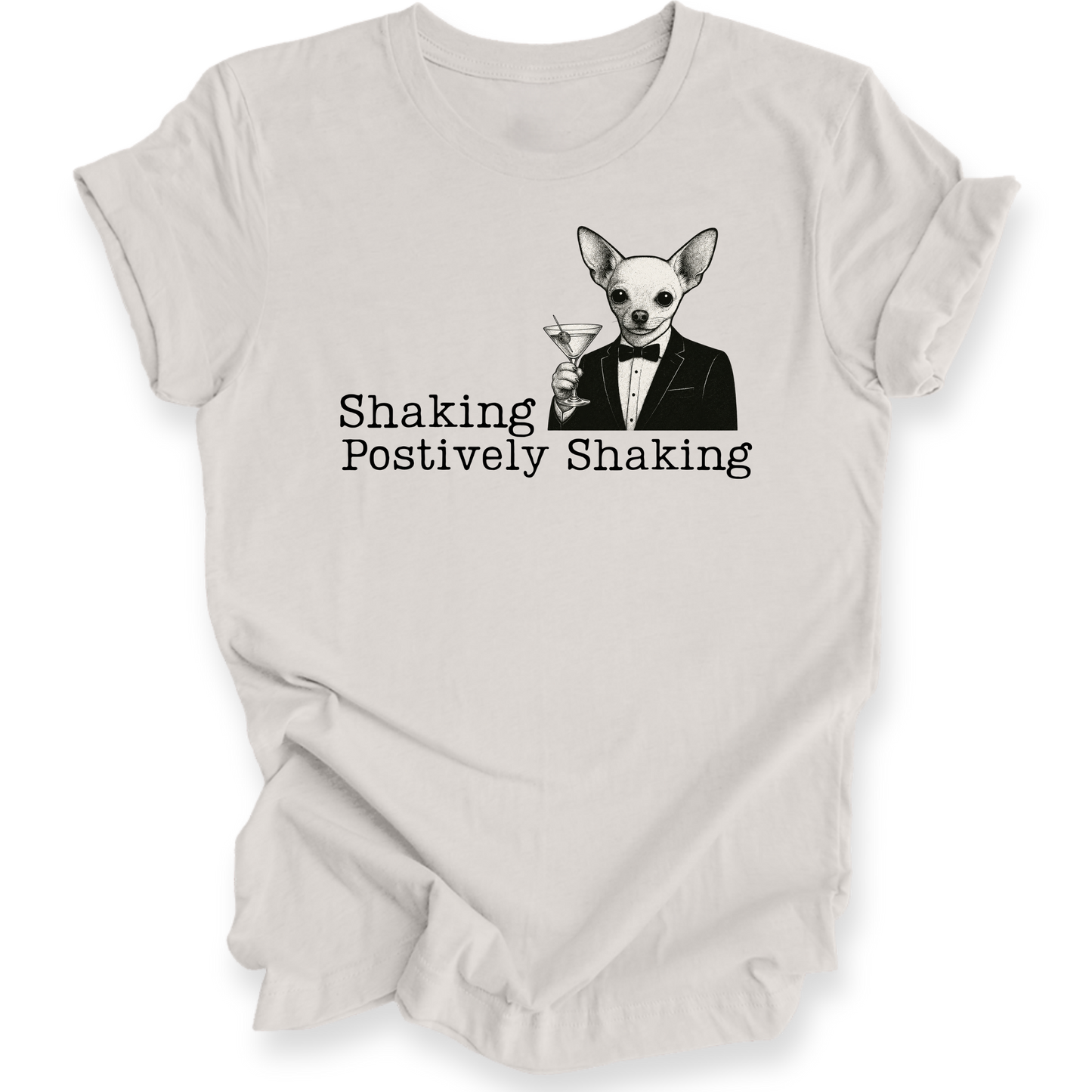 White t-shirt with a dog in a suit graphic and text 'Shaking Postively Shaking' on a white background