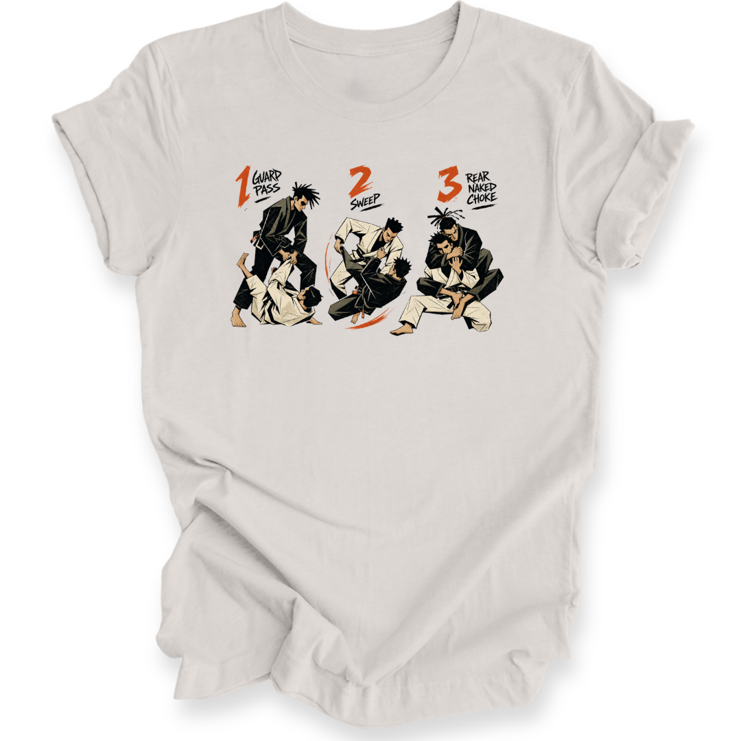 A light beige short-sleeve crewneck t-shirt featuring a graphic print of three martial arts figures in a sequence, labeled '1 Guard Pass', '2 SWEEP', and '3 REAR NAKED CHOKE' in orange and black text.