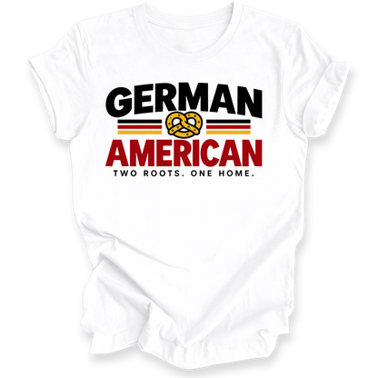 A white short-sleeve t-shirt with a graphic print on the front. The design features the words 'GERMAN AMERICAN' in bold black and red lettering, separated by a yellow pretzel symbol and flanked by thin red and black stripes.