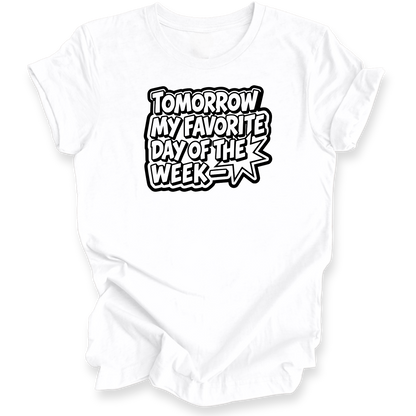 A white short-sleeve t-shirt with a black graphic text print that reads 'TOMORROW MY FAVORITE DAY OF THE WEEK' in a bold, comic-style font with a starburst shape behind it, shown on a plain white background.