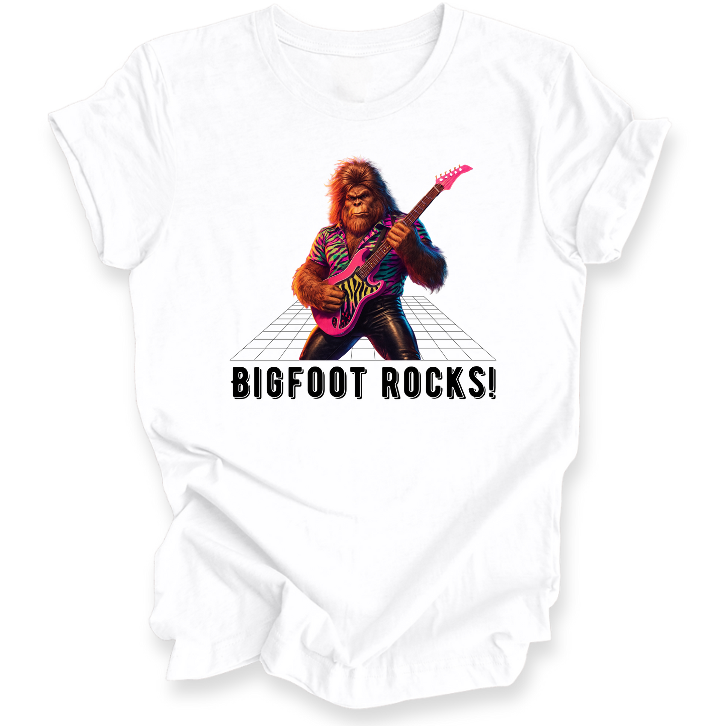 White t-shirt with a graphic of a rock-playing bigfoot and 'BIGFOOT ROCKS!' text on a white background