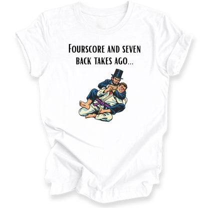 A white short-sleeve crewneck t-shirt with a graphic print on the front. The print features the text 'FOURSSCORE AND SEVEN BACK TAKES AGO.