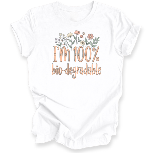 A white short-sleeve t-shirt with a graphic print that reads 'I'm 100% bio-degradable' in peach-colored lettering, decorated with small pastel flowers above the text.