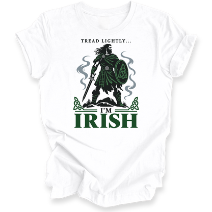 A white crewneck t-shirt with a graphic print of a Irish tartan warrior holding a shield and sword, accompanied by the text 'Tread lightly I'm Irish".