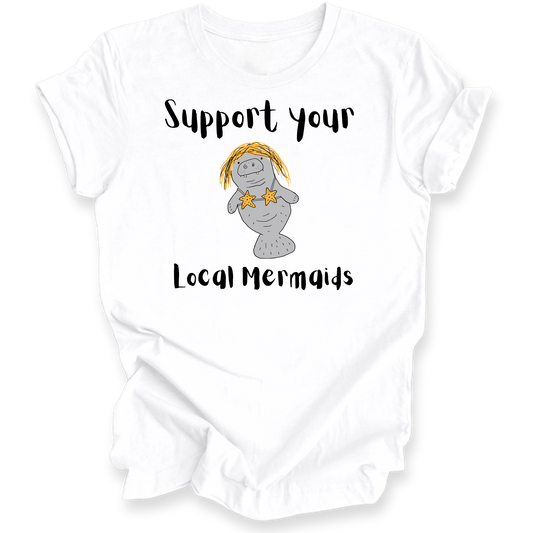 A white short-sleeve t-shirt with a graphic print of a cartoon gray mermaid with yellow hair and starfish details, accompanied by the text 'Support your Local Mermaids' in black script.
