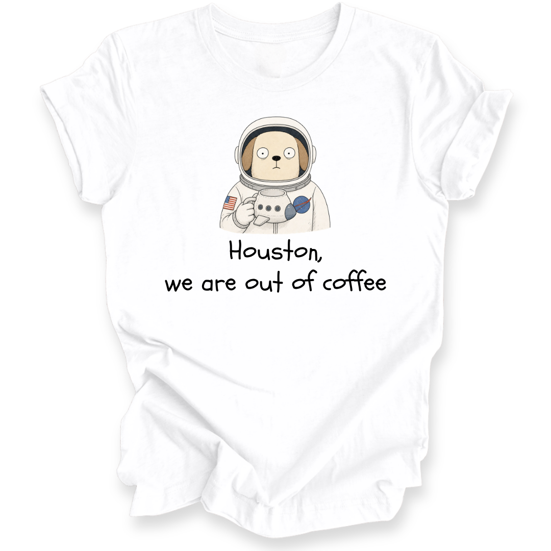 A white short-sleeve t-shirt with a graphic of a cartoon dog astronaut and the text 'Houston, we are out of coffee' printed on the front, displayed on a clean white background.